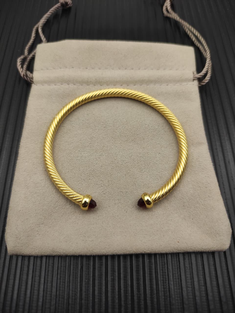 David Yurman Gold Tone Wire Bangle Bracelet with Red Gemstone